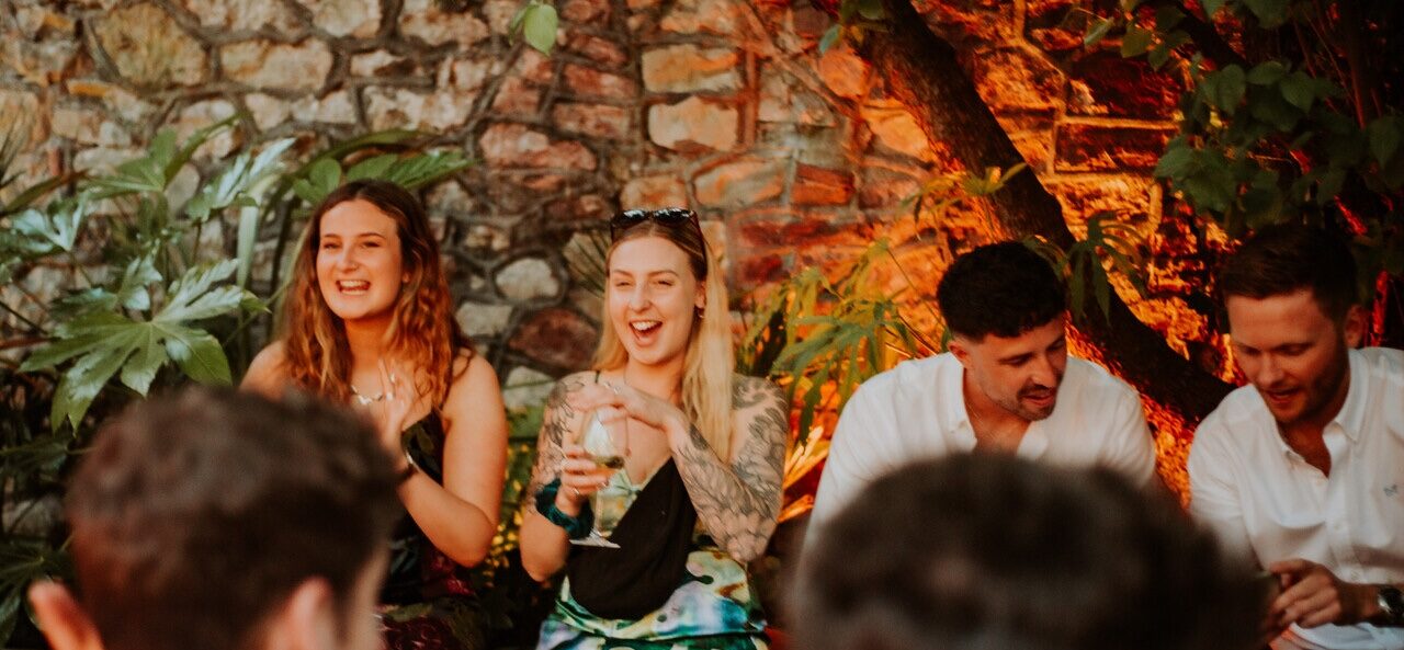 Members of The Square Club in Bristol perched in the hidden gem terrace enjoying complimentary drinks at one of the club's many prestigious networking events.
